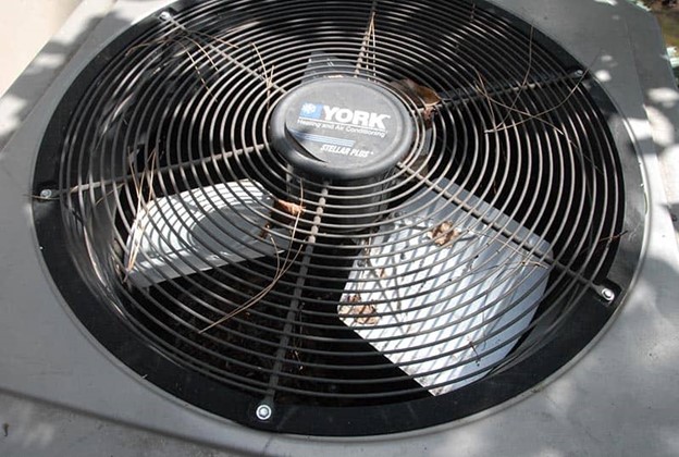 Air conditioner broken fan blades are making noise